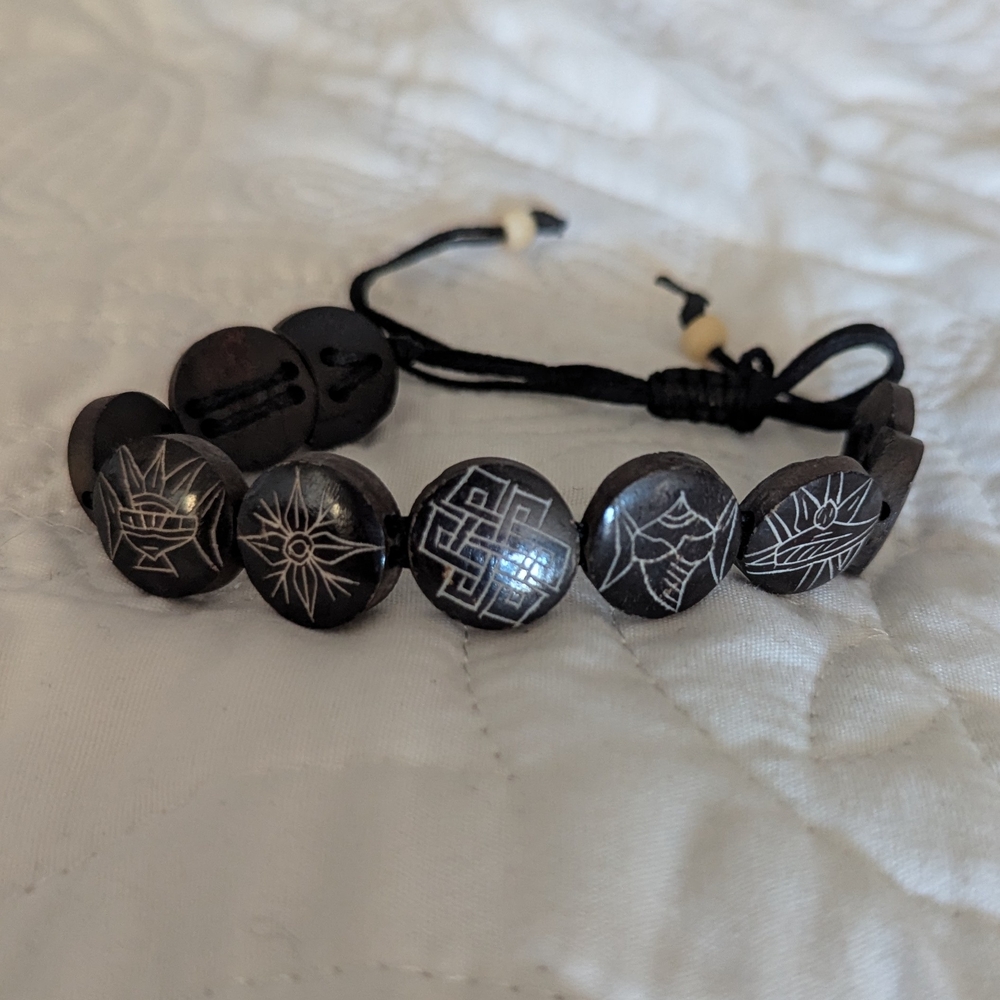 Black Beaded Bracelet with Engraved Symbols